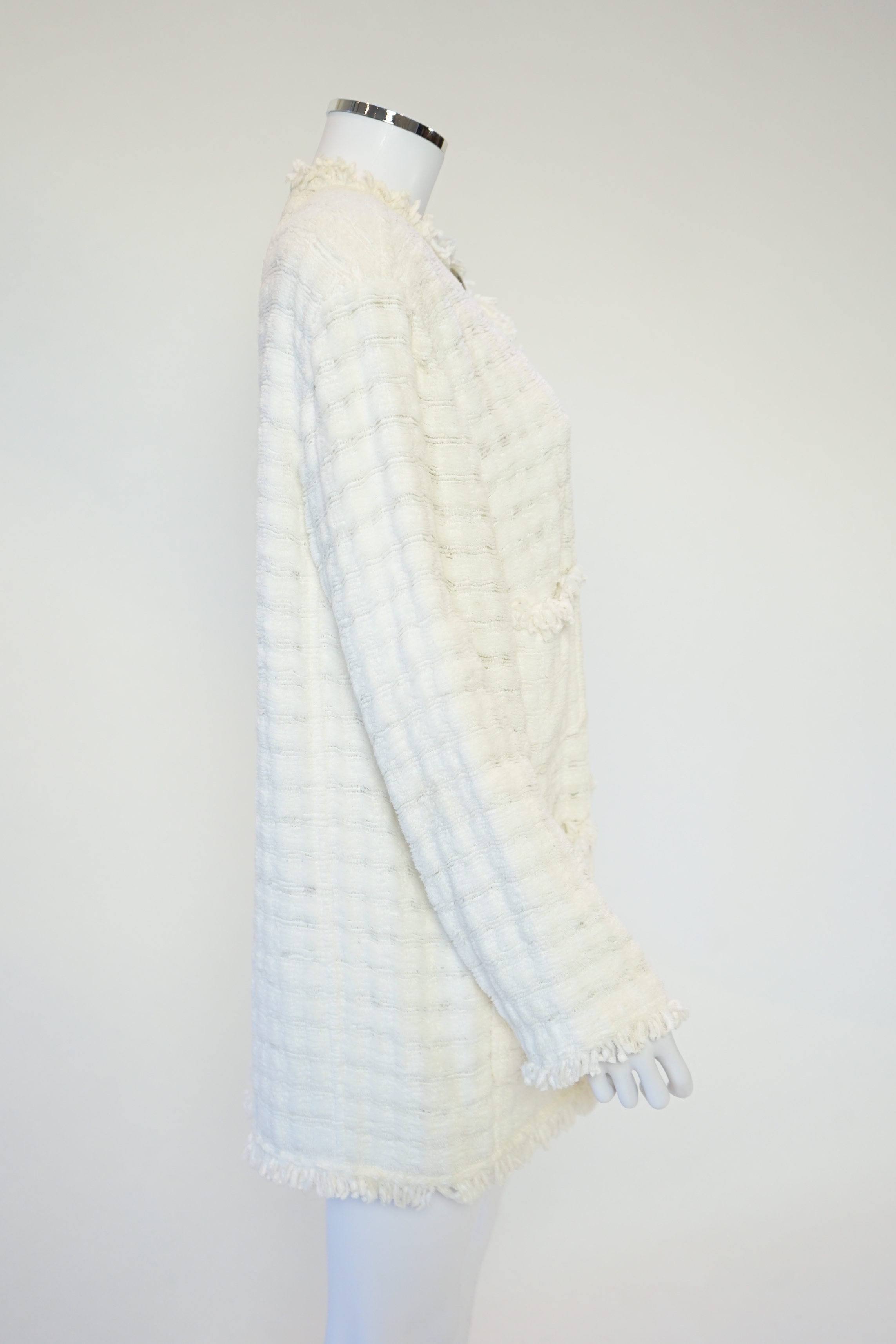 A Chanel early 1990's cream boutique jacket, size 40